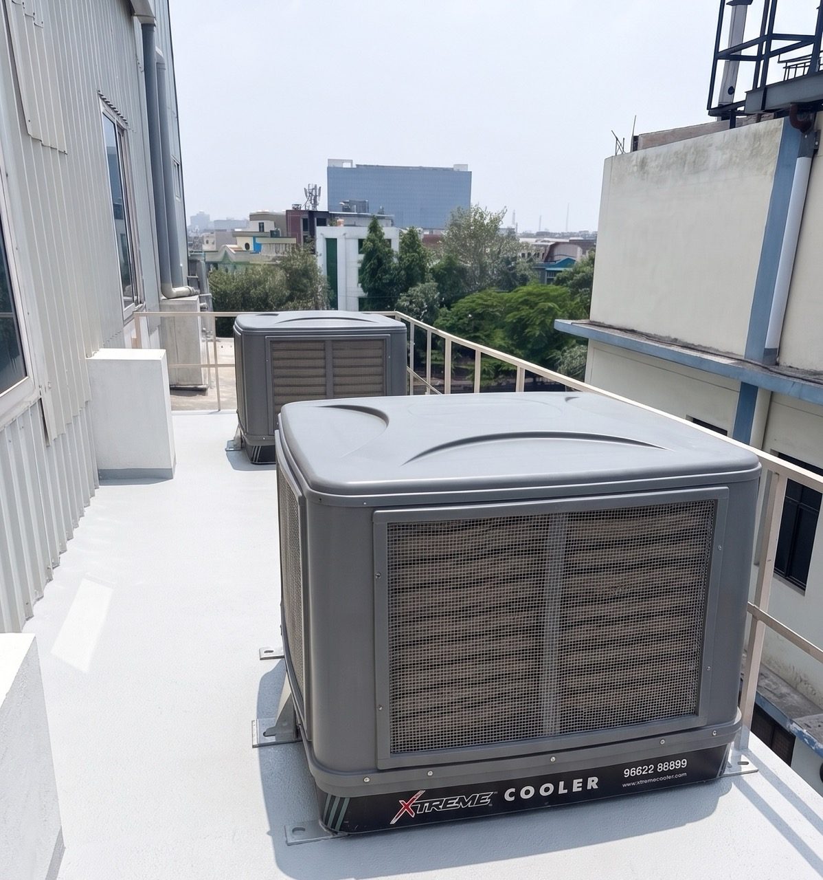 Evaporative air cooling units serving the production floor at Myra Enterprises