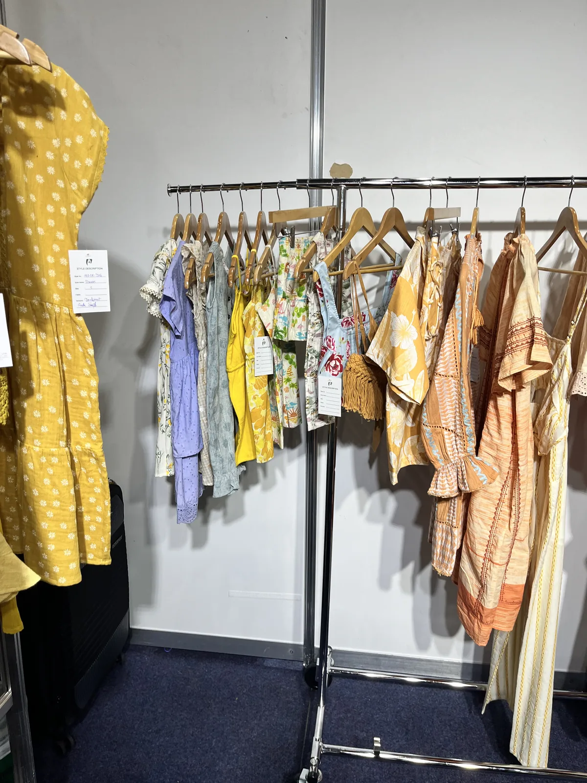 Printed and polka-dot womenswear samples at the Myra Enterprises stand, Melbourne 2023