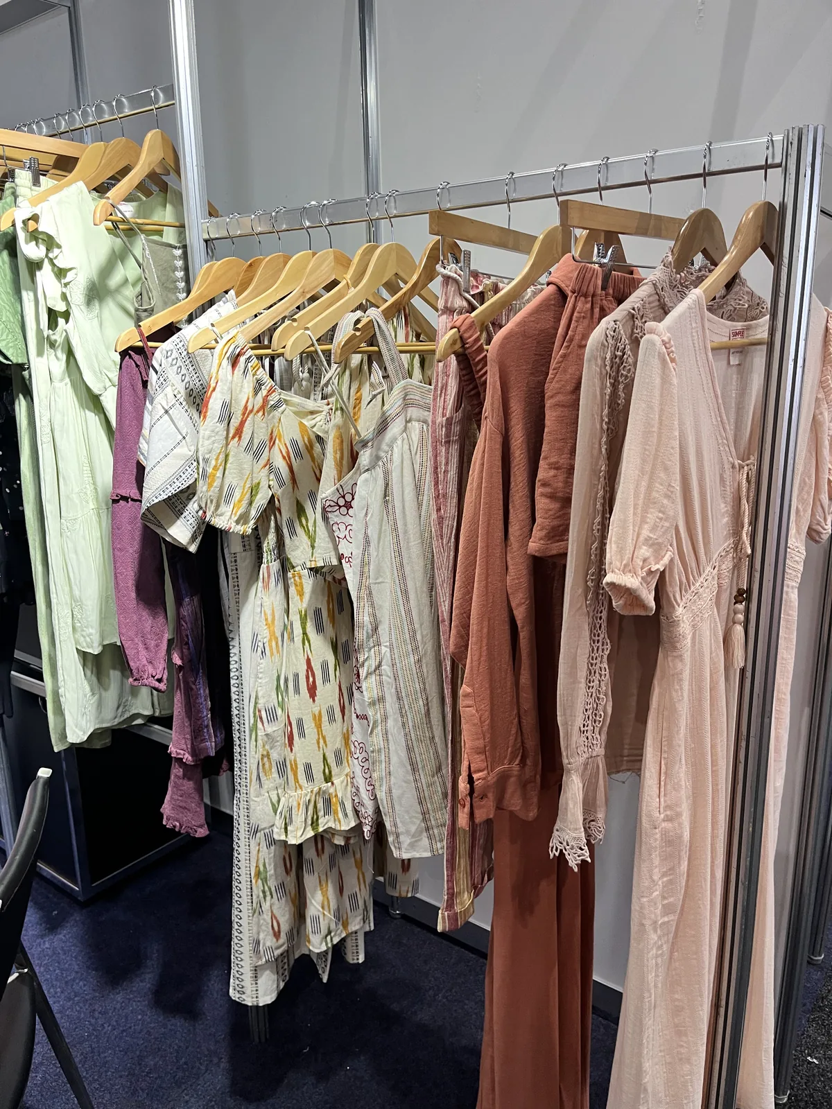 Pastel and rust womenswear collection at Myra Enterprises stand, Melbourne 2023