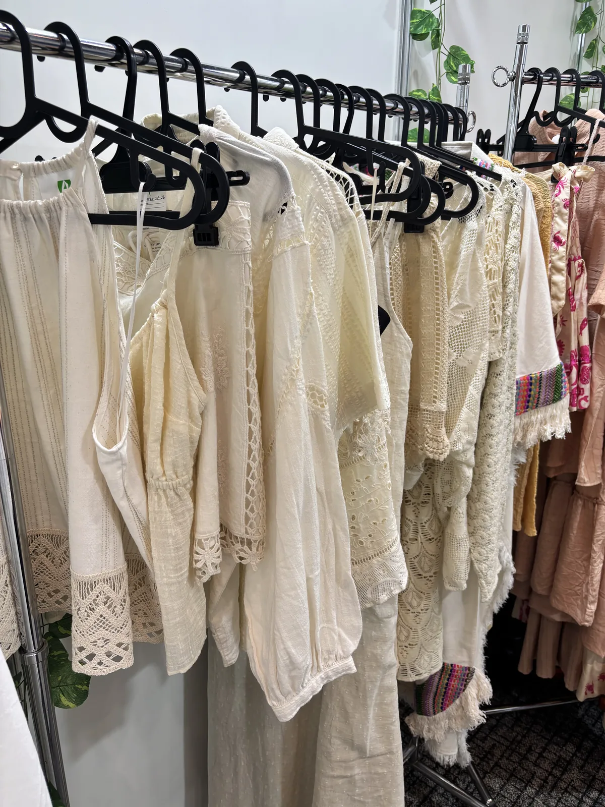 Cream lace and embroidered blouses on display, India Tex Trend Fair, Tokyo 2025