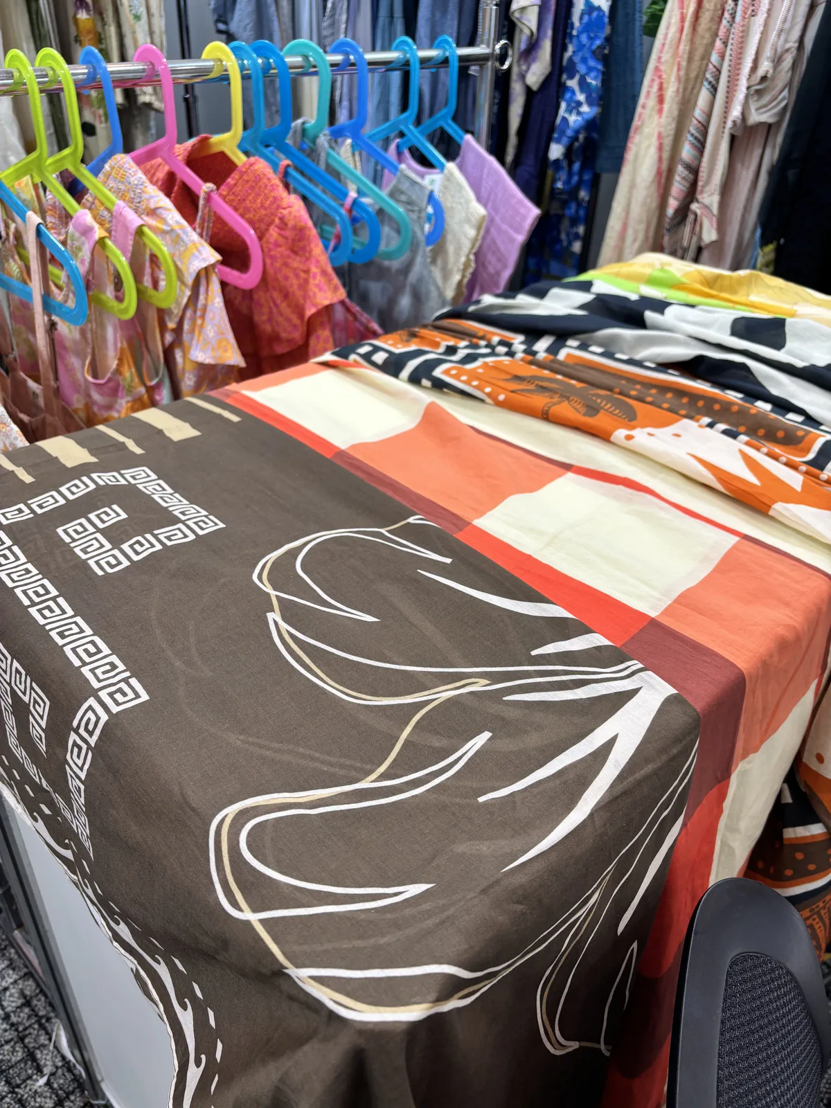 Printed scarves and fabric swatches at the Myra Enterprises stand, Tokyo 2025