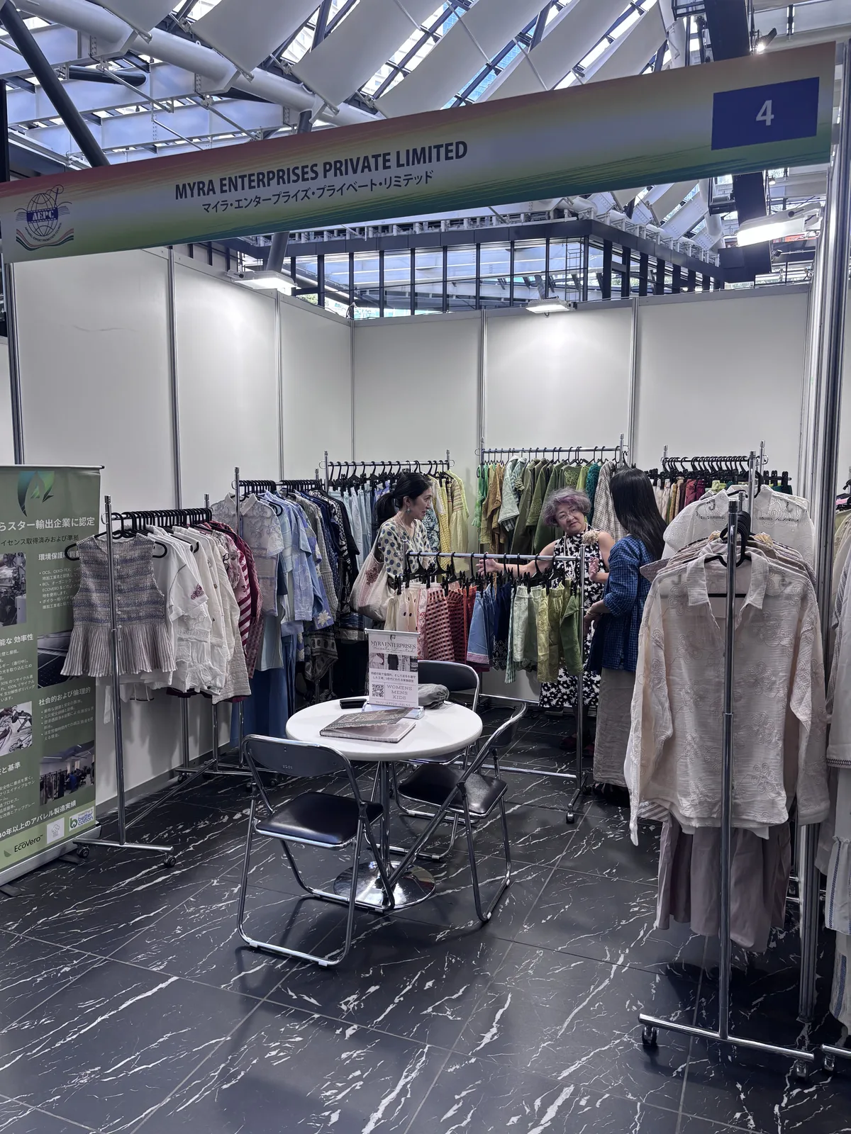 Buyer viewing the collection at the Myra Enterprises stand, Tokyo 2026